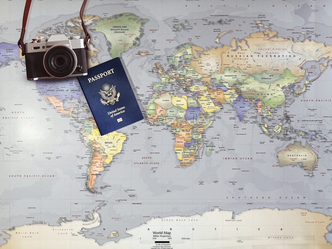 Passport and world map representing tax residency